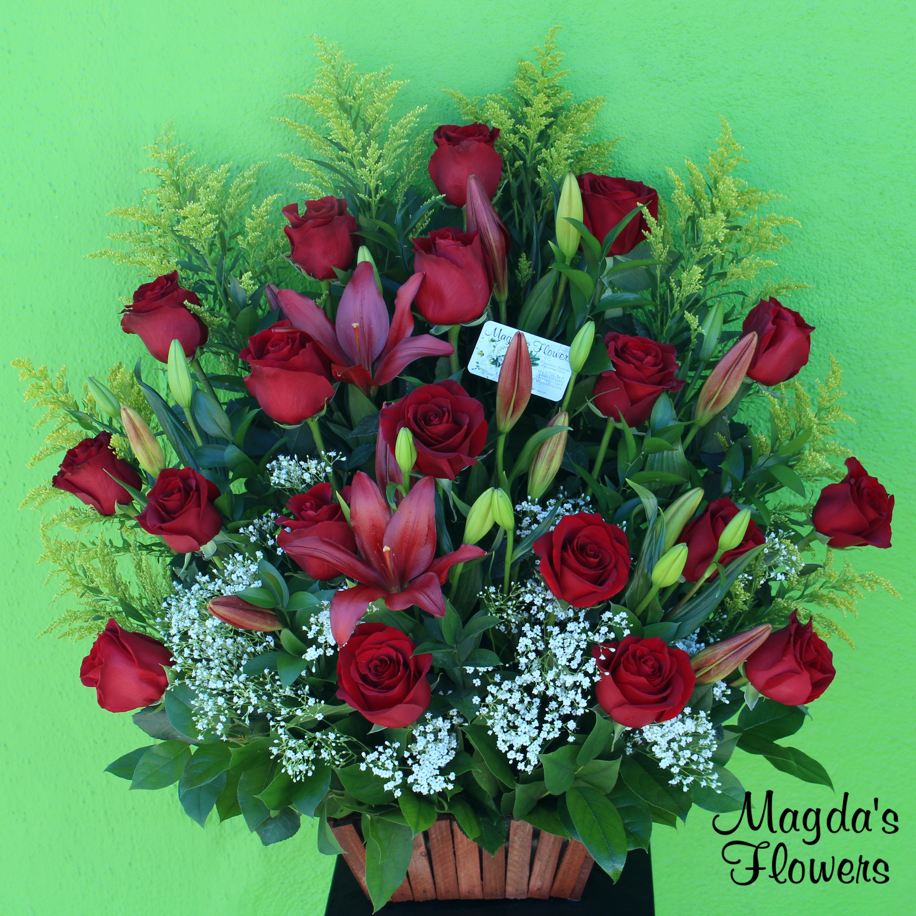 Romantic Basket - Show your love and affection with this stunning red rose basket, featuring a mix of passionate red roses and lush lilies. The perfect gift for Valentine's Day, anniversaries, or any occasion that calls for a romantic gesture.
