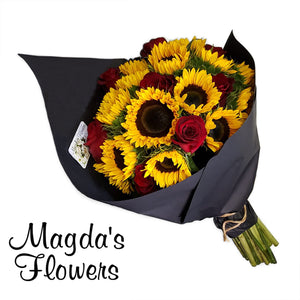 A bold combination of sunflowers and red roses in a delightful presentation creates a stunning bouquet. Order Flowers online in Salinas. Same day delivery!